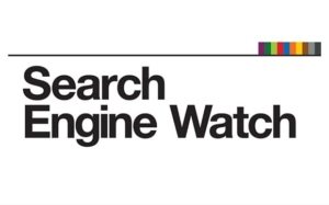 An image of the word search engine watch with a lot of colors on the top