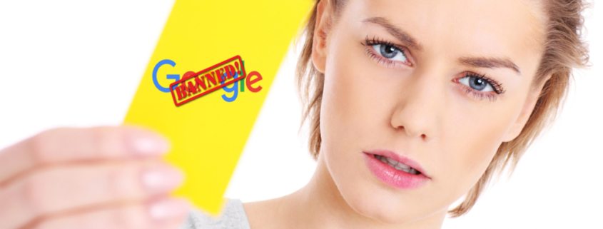a woman holding a yellow card that says google banned, google will penalized a website if they are practising Black Hat techniques.