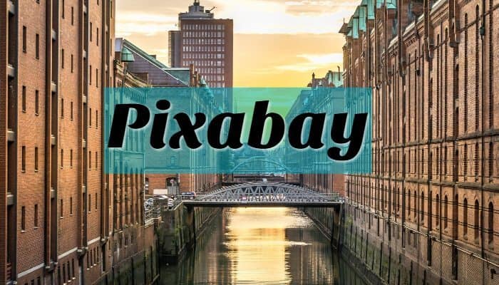 pixabay background of a bridge between two buildings.