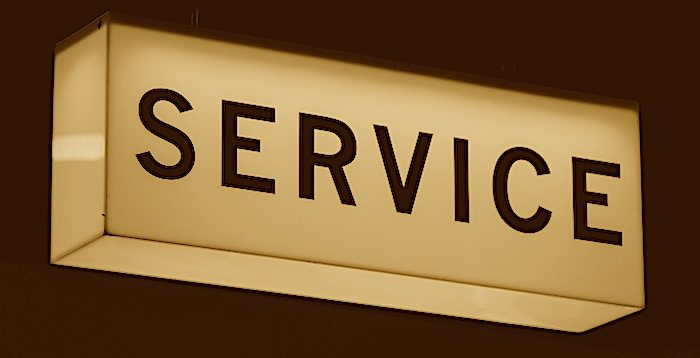 a sign that says service