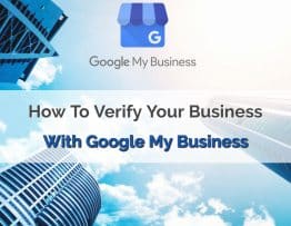 Featured image of the blog title "How to Verify your Business with Google My Business" with a background of skyscrapers
